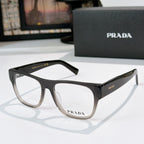 Prada eyeglasses with black rectangular frames and logo temples, clear lenses