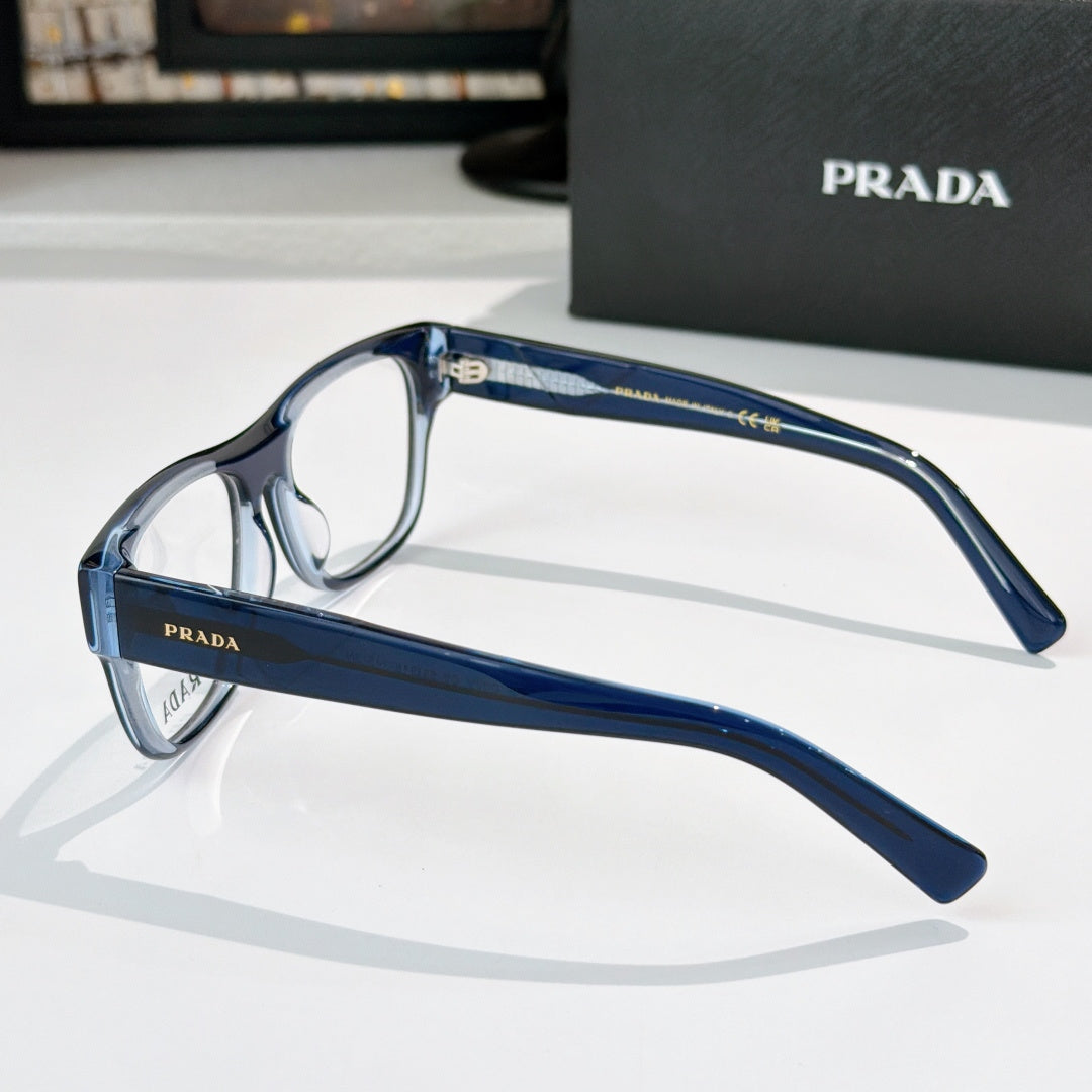 Prada eyeglasses shown from side view with blue rectangular frames, clear lenses