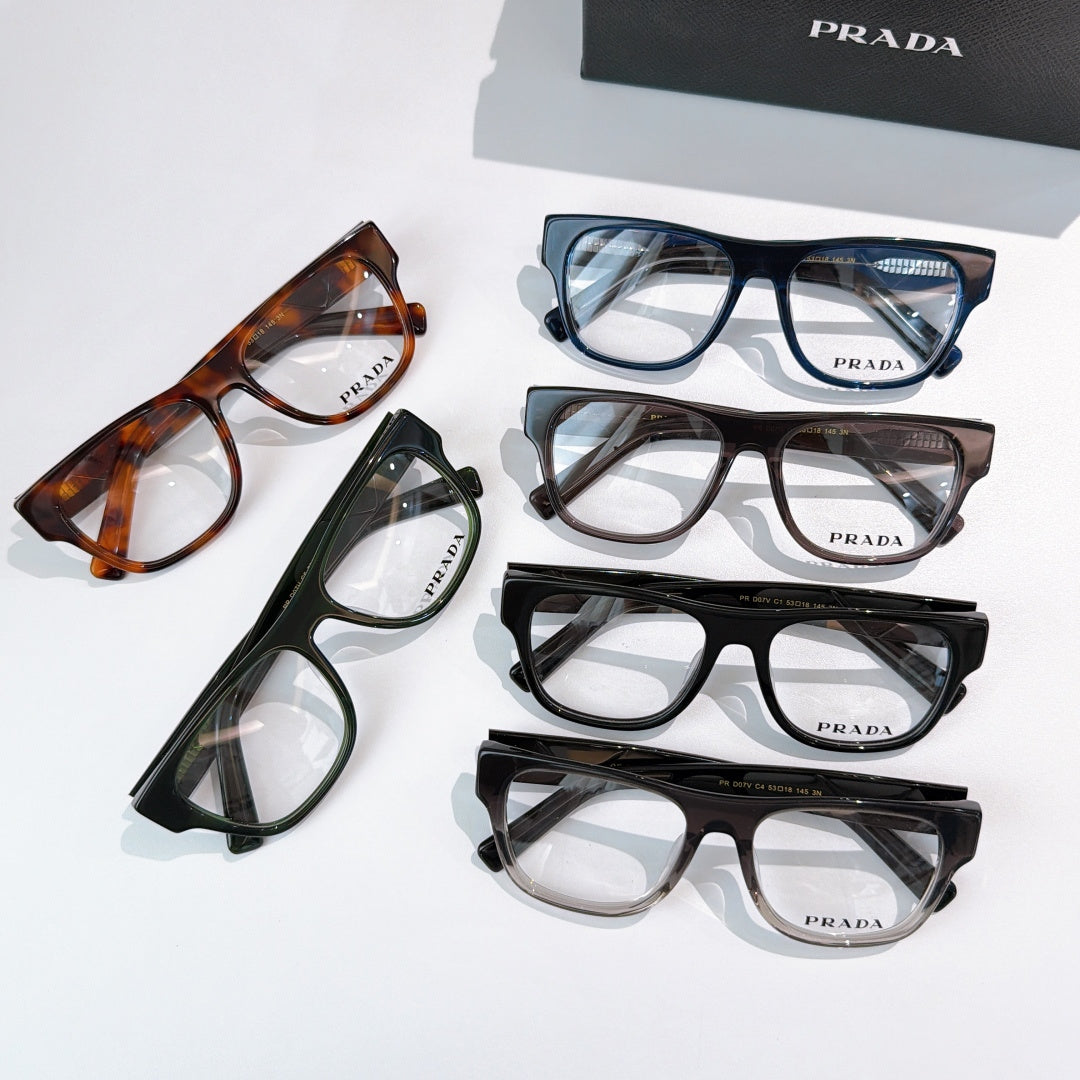 Prada eyeglasses set with multiple frame colors: tortoiseshell, black, green, and blue