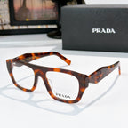 Prada orange tortoiseshell rectangular eyeglasses with logo on temple