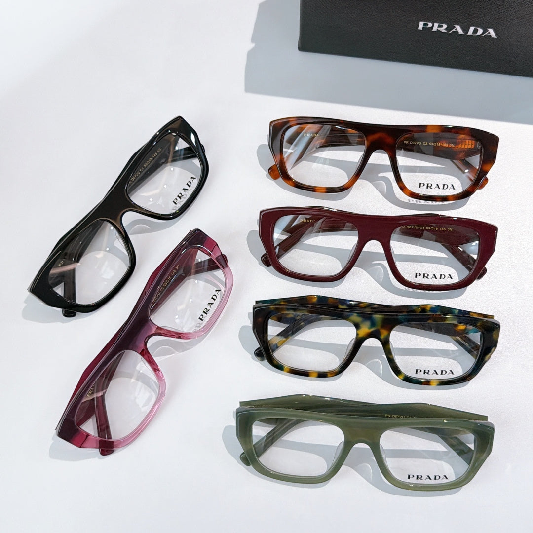 Prada eyeglasses set of five frames in black, red, tortoiseshell, and green