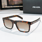 Tortoiseshell square eyeglasses with beige tinted lenses and glossy frame