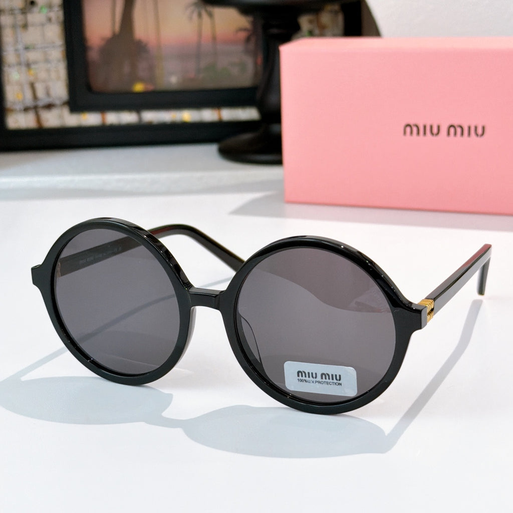 MiuMiu glasses with black round frames and dark gray tinted lenses