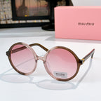 MiuMiu glasses with rose-pink round frames and light pink tinted lenses