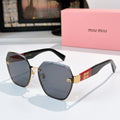 MiuMiu octagonal sunglasses with black frame and blue-gray gradient lenses