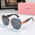 MiuMiu octagonal sunglasses with black frame and blue-gray gradient lenses