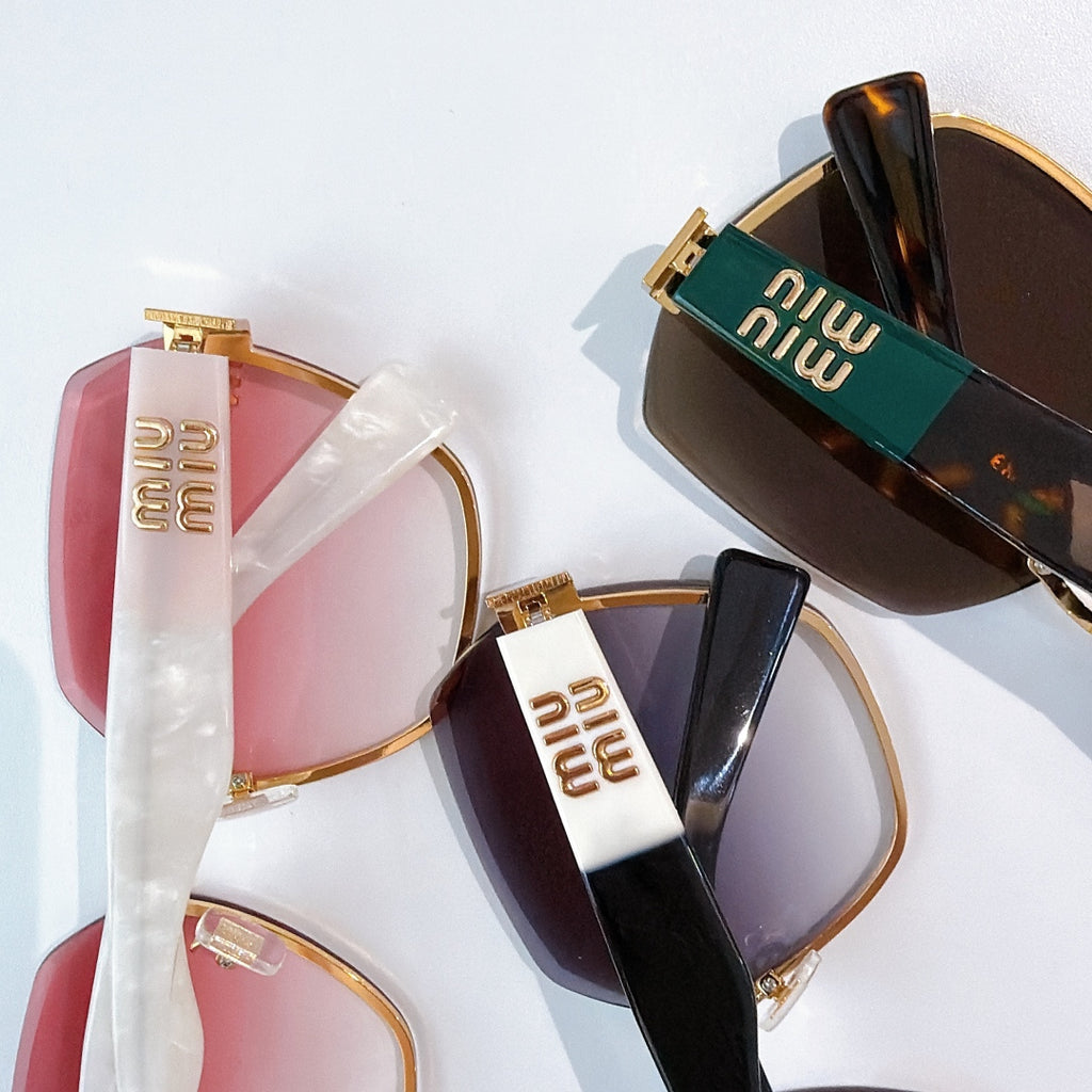 MiuMiu sunglasses with mixed frames and colored lenses, featuring gold-tone details