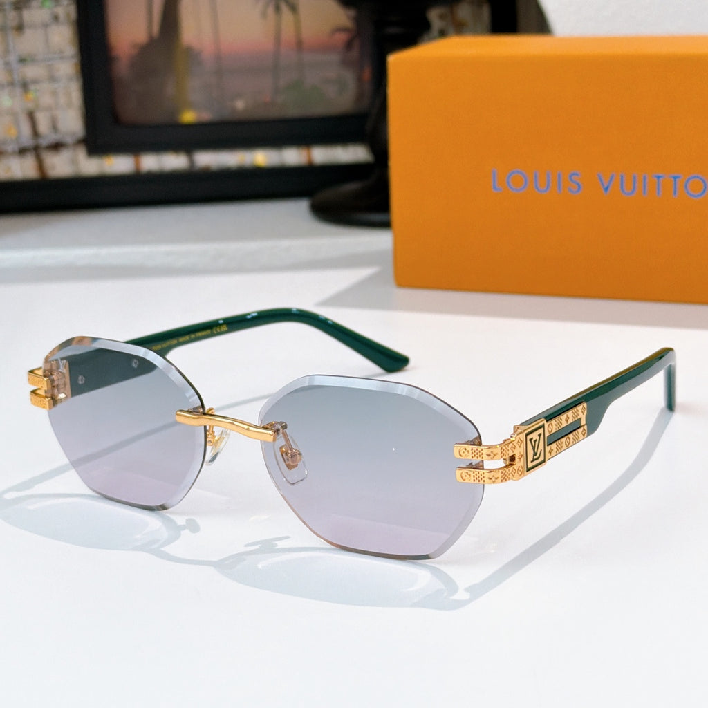 Sunglasses with cool-toned lenses, gold-tone frame and green temple tips