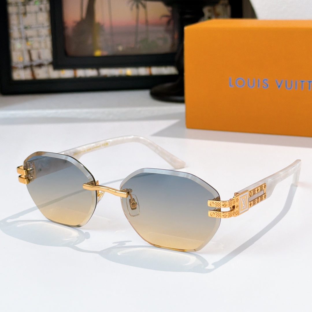 Sunglasses with light amber tinted lenses and gold-tone frame, round silhouette