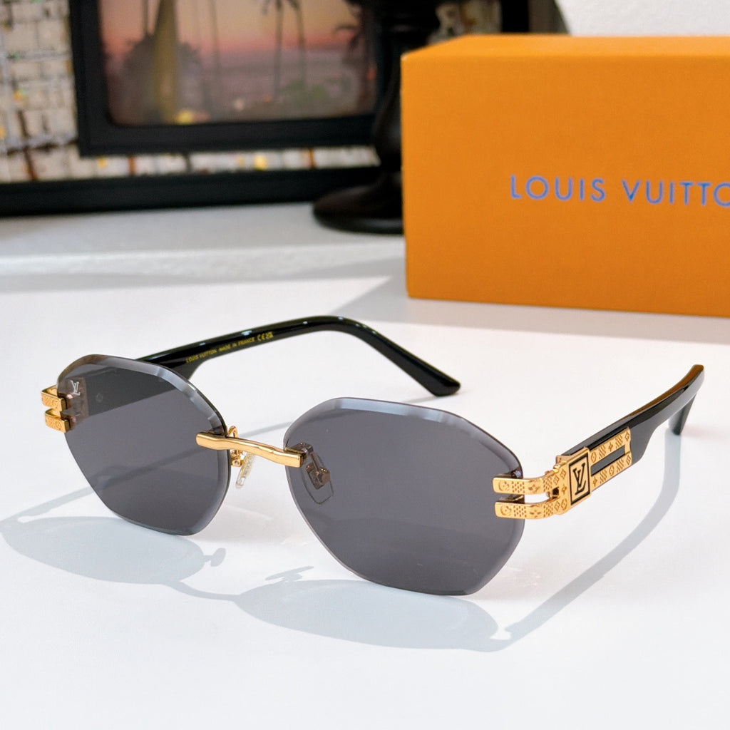 Sunglasses with dark lenses and gold-tone frame accents, round shape