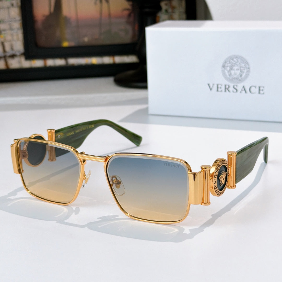 Versace sunglasses with gold frame, green temples, and blue tinted square lenses