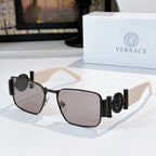 Versace sunglasses with black frame and dark purple tinted square lenses