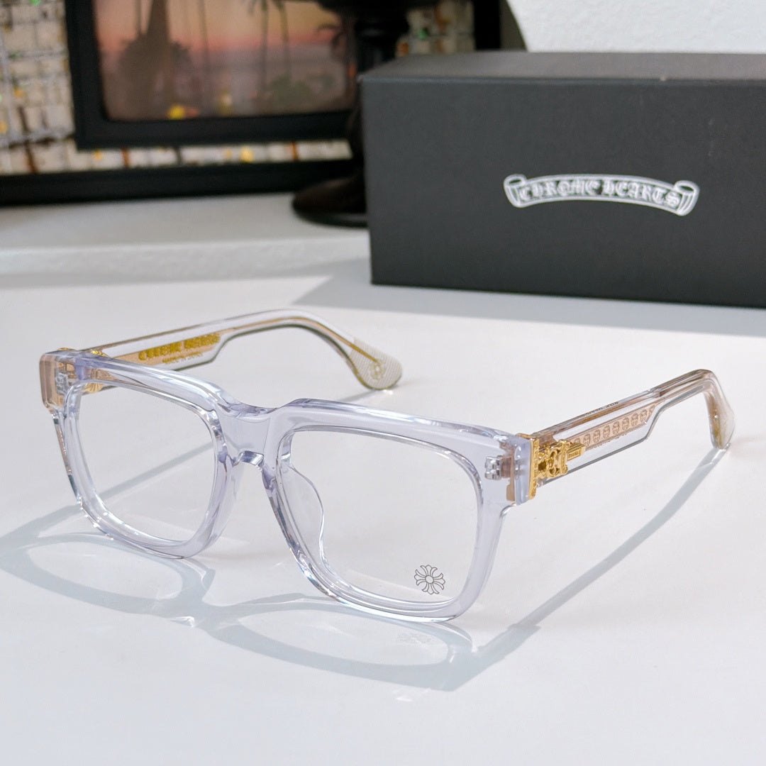 Clear plastic square eyeglasses with gold-toned decorative temple detail