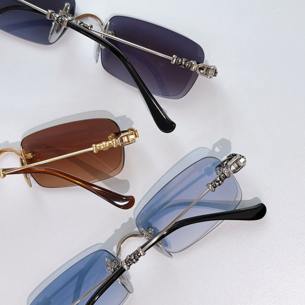 Assorted sunglasses with tinted lenses in dark, brown, and blue tones