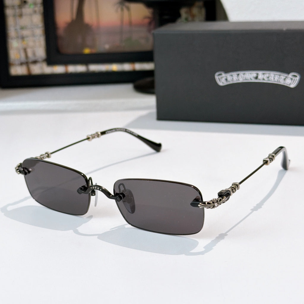 Sunglasses with dark gray tinted rectangular lenses and black metal frame