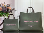 Louis Vuitton shopping bag set in sage green with matching small pouch and top handles