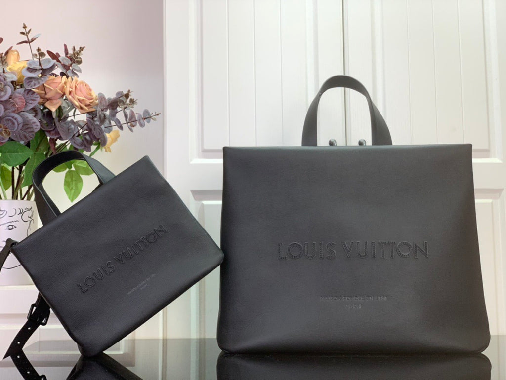 Louis Vuitton shopping bag set in dark gray with matching small pouch and top handles