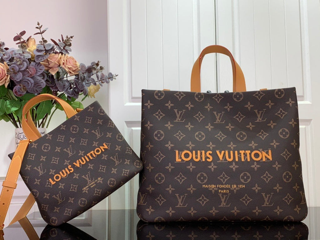 Louis Vuitton monogram shopping bag with brown handles and matching small crossbody pouch