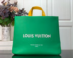 Louis Vuitton shopping bag in bright green with top handles and printed logo