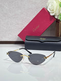 Gold-rim sunglasses with dark gray lenses and black temple tips