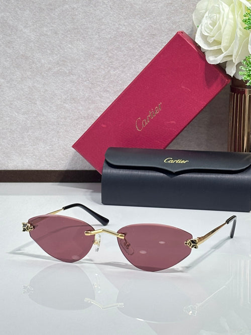 Gold-rim sunglasses with wine pink lenses and black temple tips