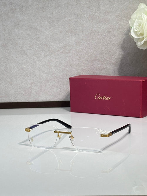 Cartier eyeglasses side view with black temples, clear lenses, gold details