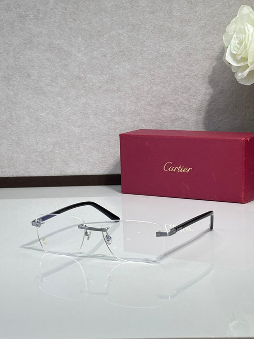 Cartier eyeglasses with black frame, clear lenses, gold accents