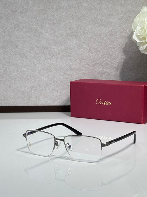 Cartier eyeglasses with black frame and clear lenses, thin metal arms