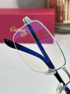 Cartier eyeglasses with blue temple arms and silver metal frame, clear lenses