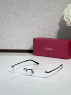 Cartier eyeglasses with black rectangular frame and clear lenses, slight purple detail