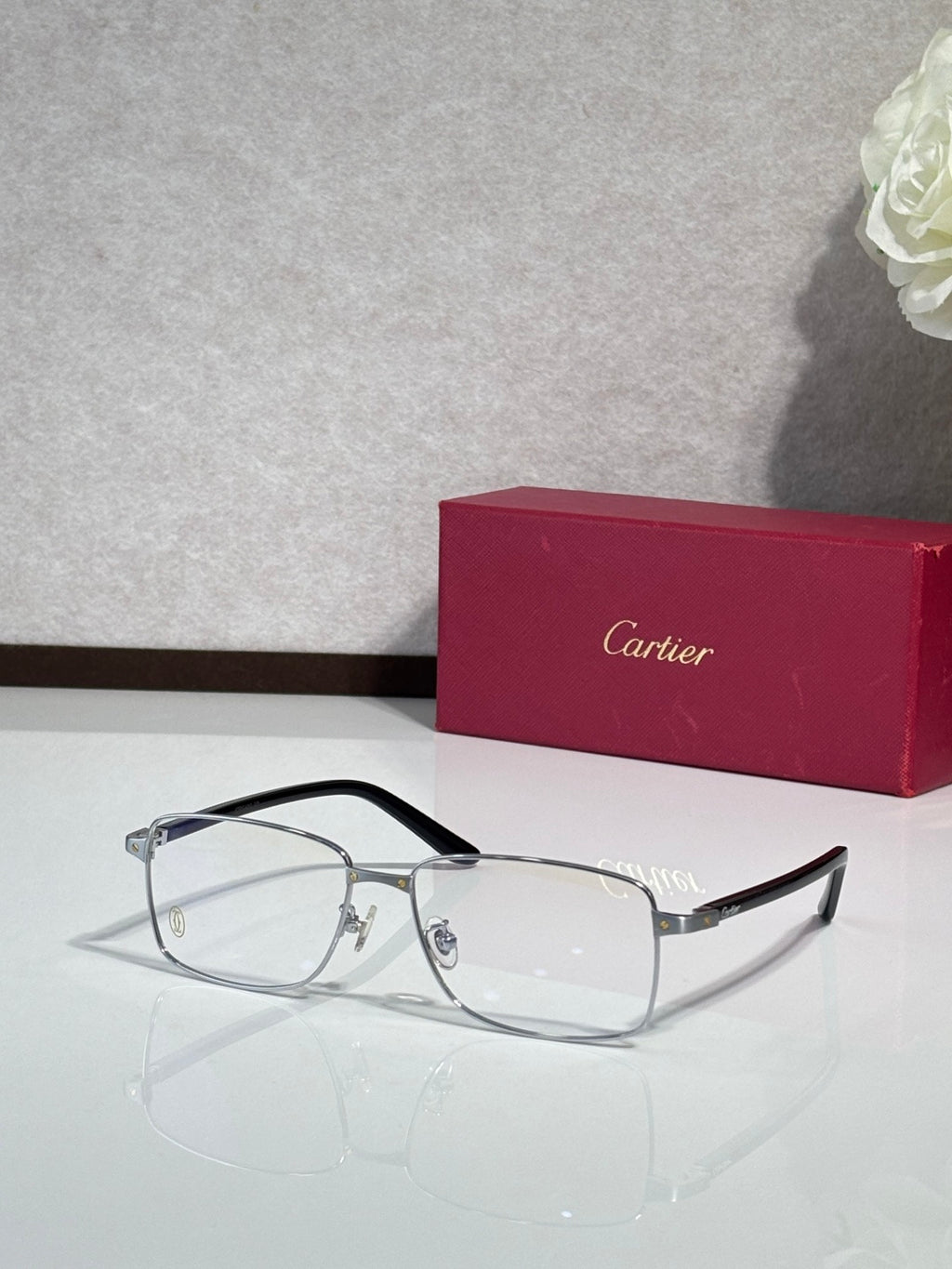 Gunmetal rectangular eyeglasses with clear lenses and metal bridge