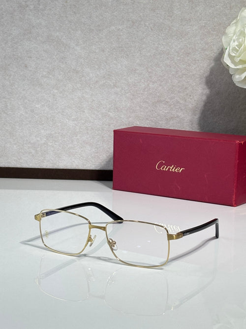 Gold rectangular eyeglasses with black temple arms and clear lenses