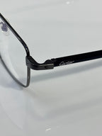 Black eyeglasses hinge with Cartier logo on temple arm