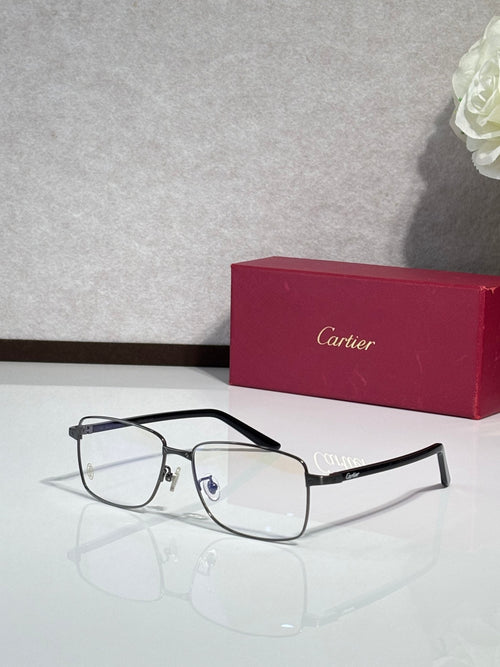 Black rectangular eyeglasses with metal temples and clear lenses