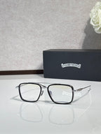 Black rectangular eyeglasses with clear lenses and visible blue hinge detail.
