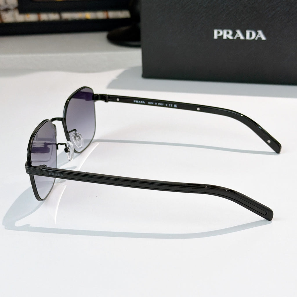 Sunglasses side view with dark purple tinted lenses and black full-rim frame.