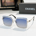 Square sunglasses with silver frame and blue tinted lenses