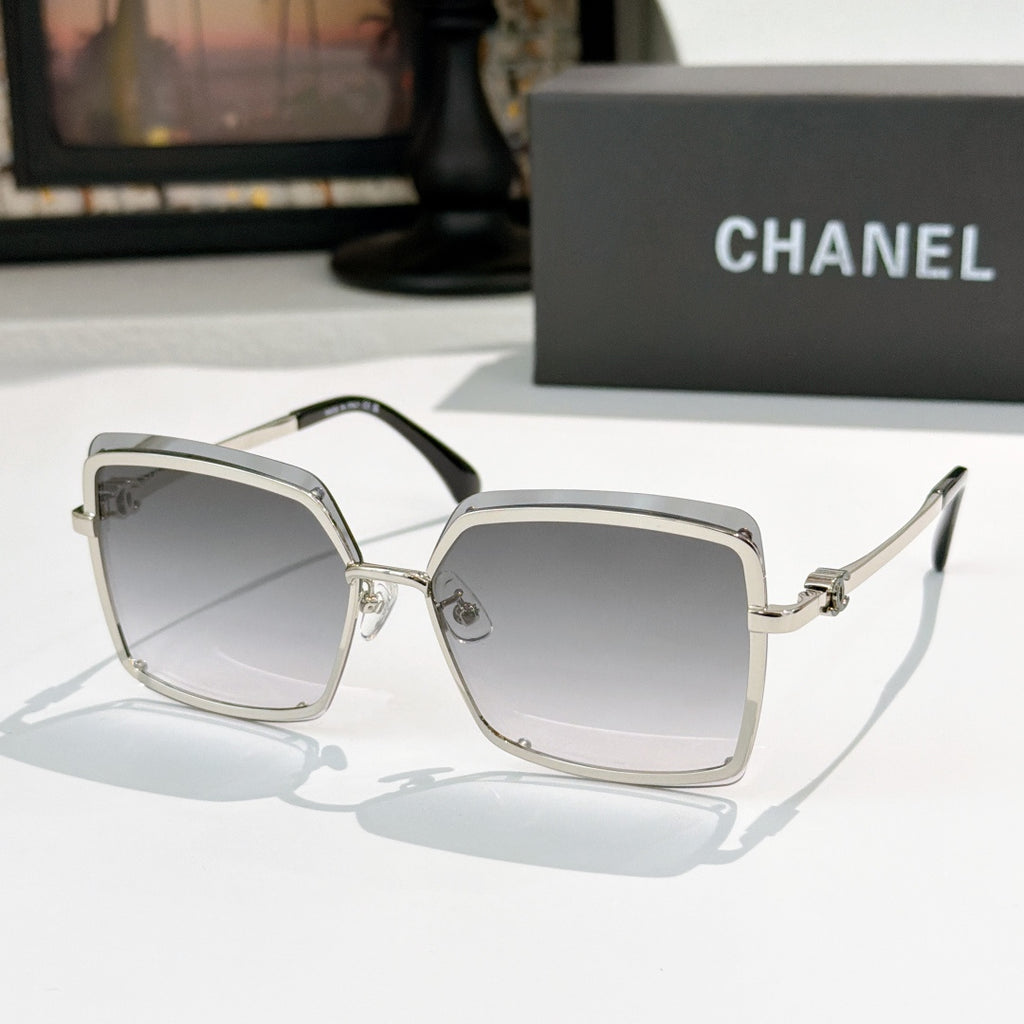 Square sunglasses with silver frame and light gray lenses