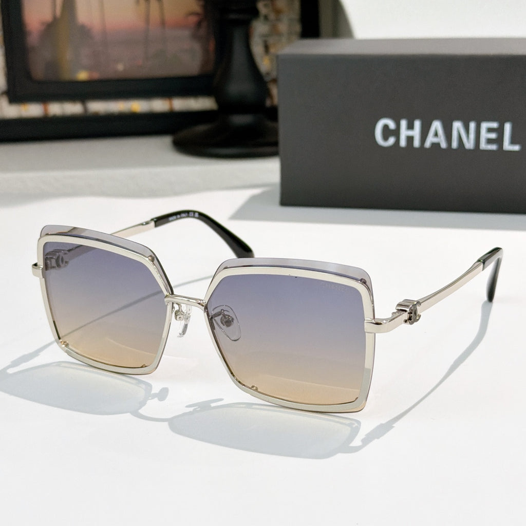 Square sunglasses with silver frame and dark purple-gray lenses