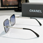 Square sunglasses with silver frame, blue lenses, and black temples
