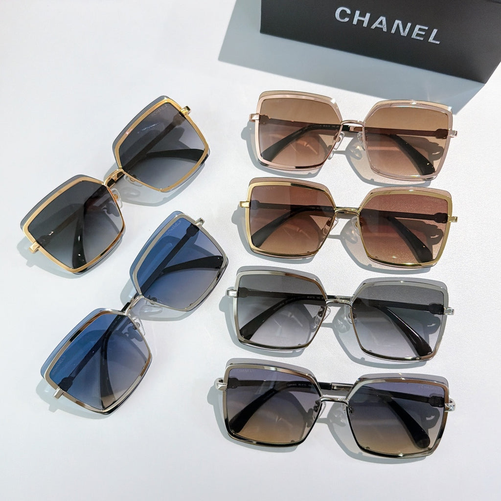 Assorted square sunglasses with blue, brown, and dark tinted lenses