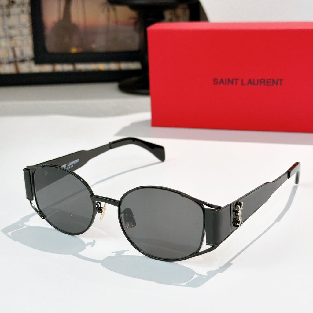 Celine sunglasses with dark lenses and black frame, silver-tone metal details at hinges.