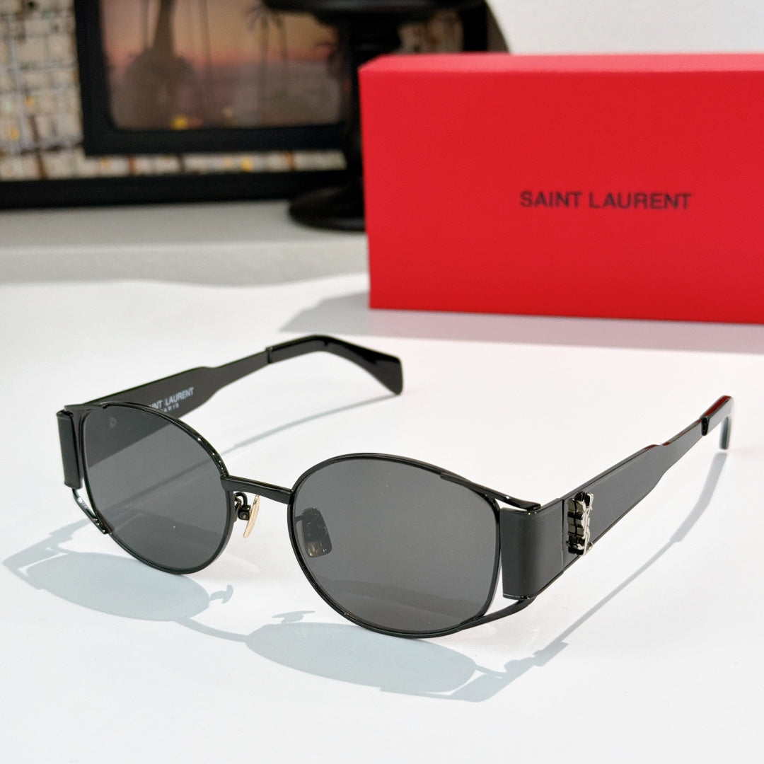 Celine sunglasses with dark lenses and black frame, silver-tone metal details at hinges.