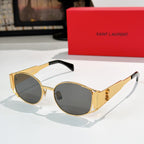 Celine sunglasses with dark lenses and gold-tone metal frame, black temple tips.