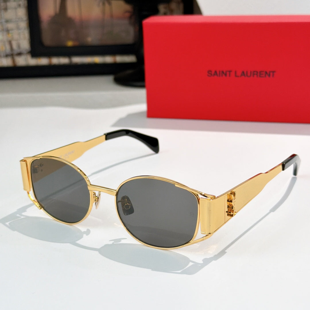 Celine sunglasses with dark lenses and gold-tone metal frame, black temple tips.