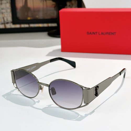 Celine sunglasses with dark lenses and black temple arms, silver-tone metal frame.