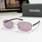 Chanel glasses with mauve purple lenses, silver frame and black temples