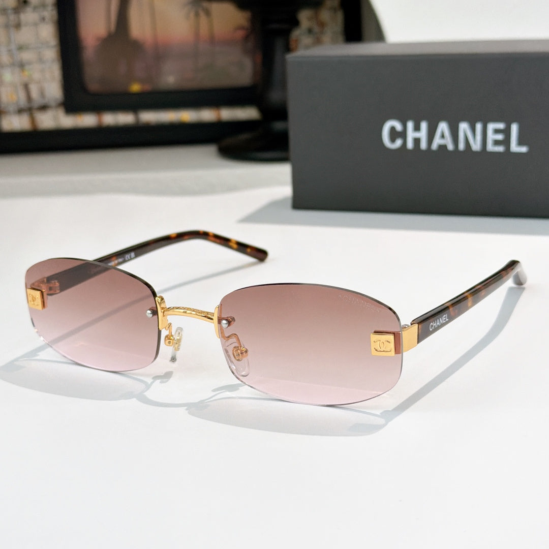 Chanel glasses with rose lenses, gold frame and tortoiseshell temples