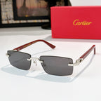 Cartier eyeglasses with dark frame, red temple arms, and gold details, rectangular dark lenses