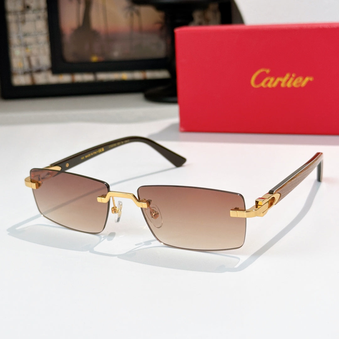 Cartier eyeglasses with black frame and gold detailing, rectangular warm-tinted lenses